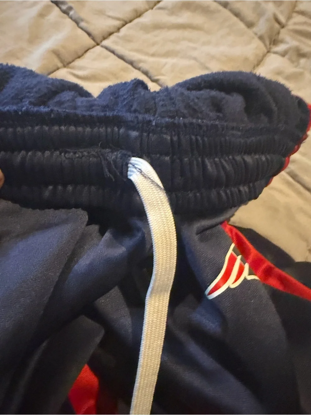 NFL Navy Joggers with Red Side Panels and Team Logo